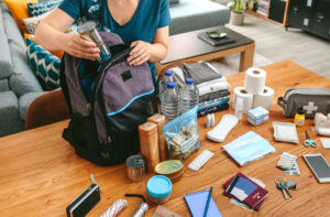 Woman preparing an emergency kit