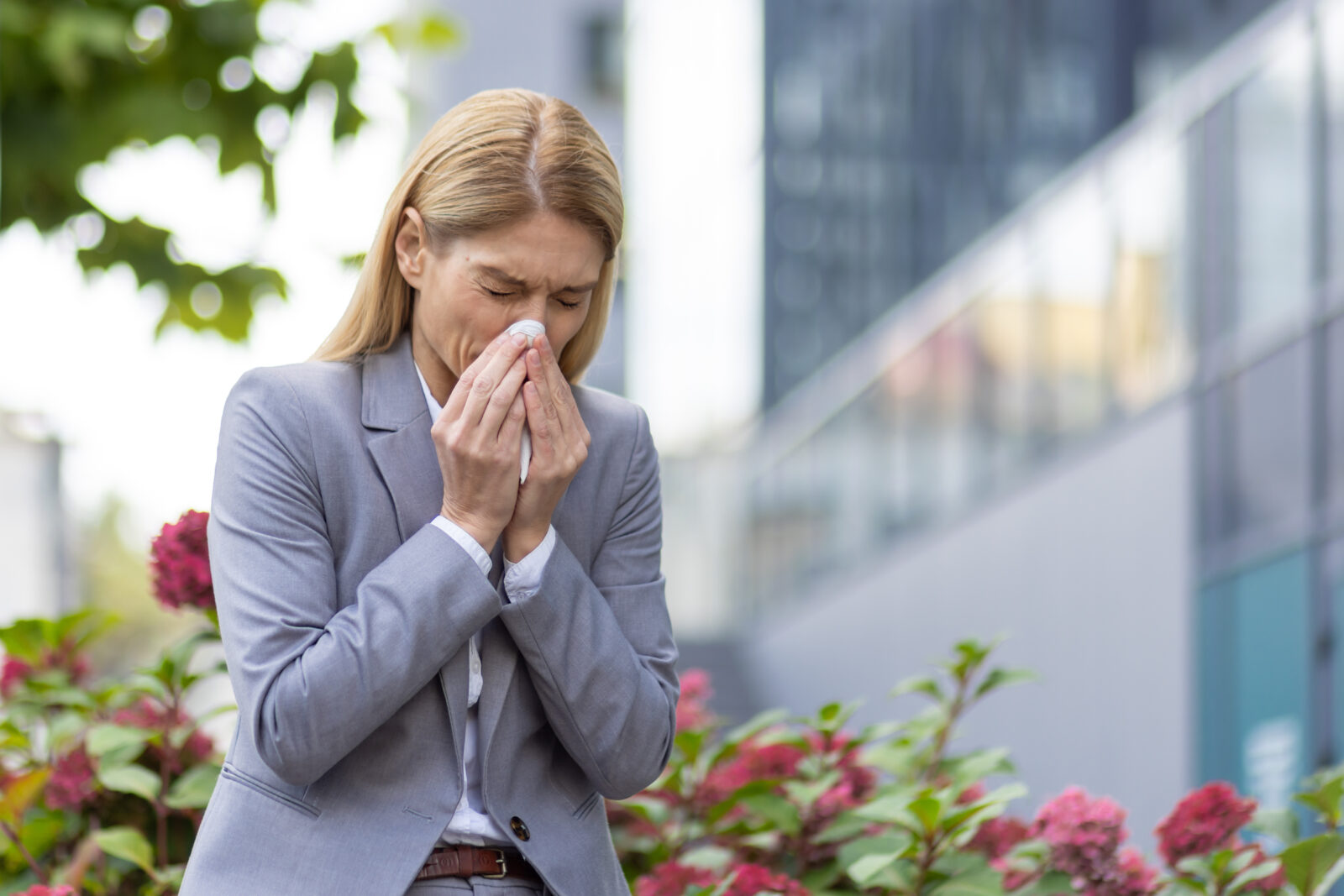 woman sneezing